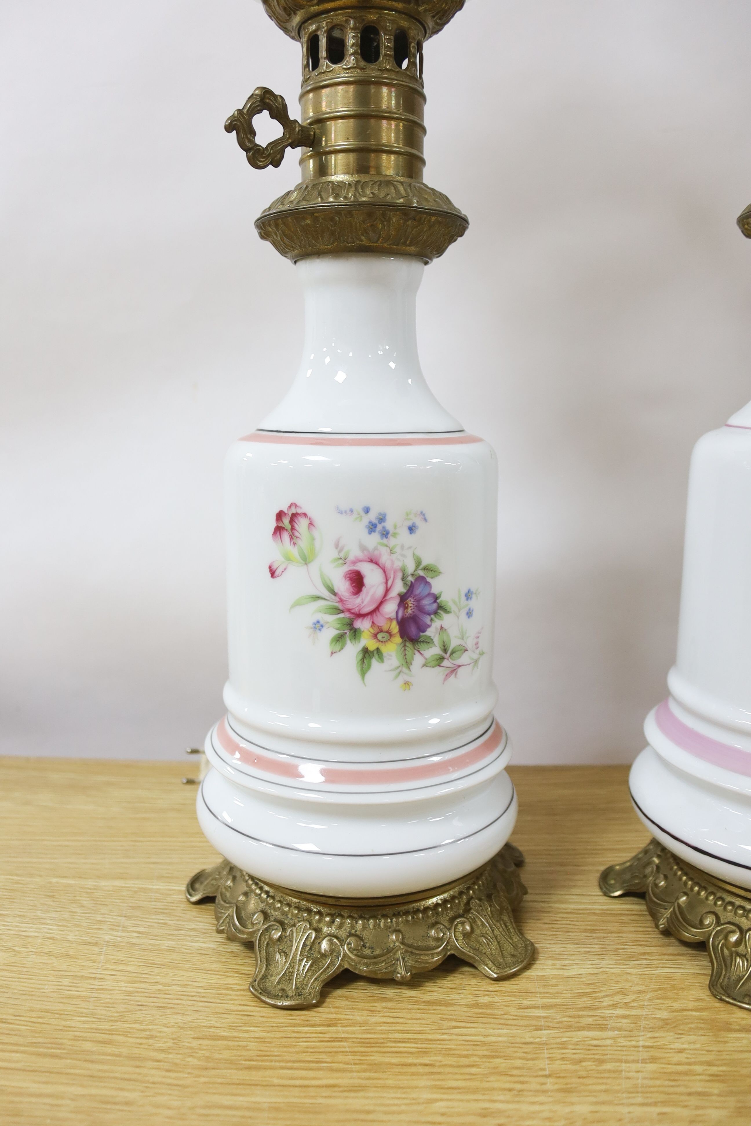 A pair of Napoleon III porcelain converted oil lamps. 59cm